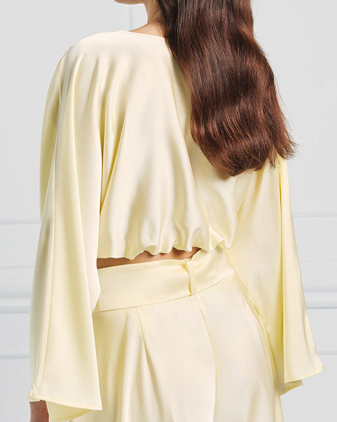 Aqua draped blouse with knot